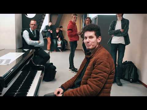 Man tips bottle over when Pianist is playing FIRST LIGHT at Amsterdam Train Station – Thomas Krüger Video
