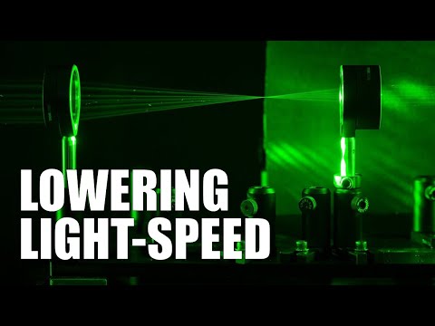 Lenses : a slower speed of light