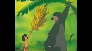 Jungle Book Baloo bear and Mowgli sing The Bare Necessities