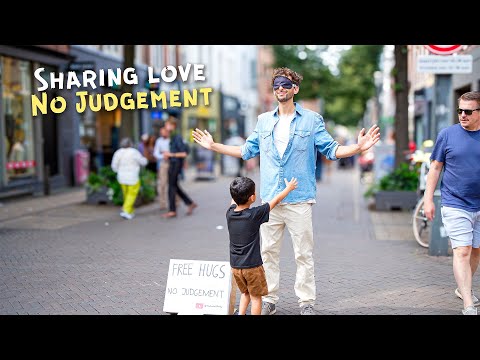 Giving FREE HUGS while blindfolded *HEARTWARMING*