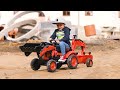 Falk šlapací traktor 2065N Kubota backhoe s předním bagrem a přívěsem s otočným bagrem