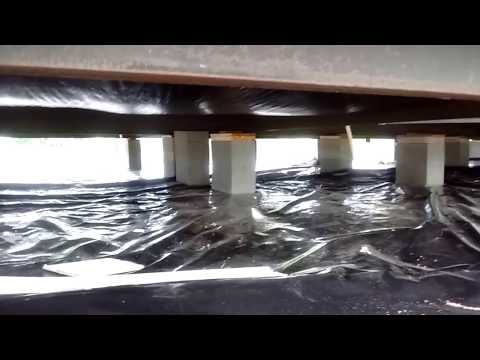 Manufactured Home Set and Level on FHA HUD Foundation with Tie Strap Anchors