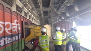 Robotic cement bag loading in train bogie