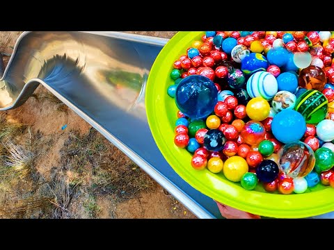 1000 Marbles in a Super Slide Marble Run vs Water Balloons