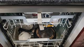 How to open the door of a Miele dishwasher.