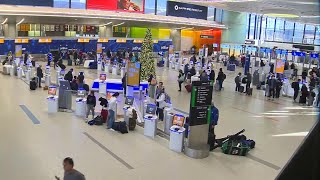 Some holiday travelers beating stormy weather, leaving early