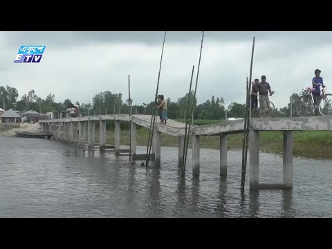 গাইবান্ধায় সেতুতে সিমেন্টের স্লাপের বদলে কাঠের পাটাতন