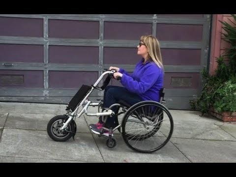 Attachable wheelchair motor handcycle will speed up your travels