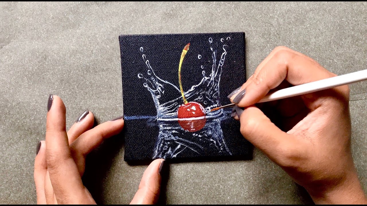 hyper realistic miniature painting cherry in water by paintastic arts