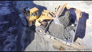 CAT 992C wheel loader and 777F haul trucks in action