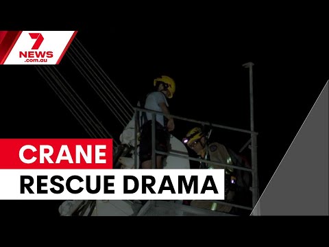 Teenager rescued from 30-metre crane in Melbourne | 7NEWS