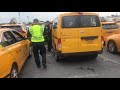 Taxi driver is arrested in the LaGuardia airport taxi hold lot