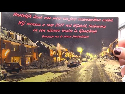 Reportage: Buren sturen Action in Glanerbrug ludieke kerstkaart (TV Enschede)