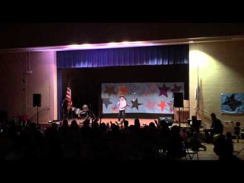 Bruno Mars, when I was your man, 11 year old boy singing it.