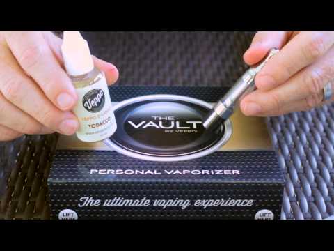 Part of a video titled "The VAULT" Vaporizer - Replacing the atomizer and filling the tank.
