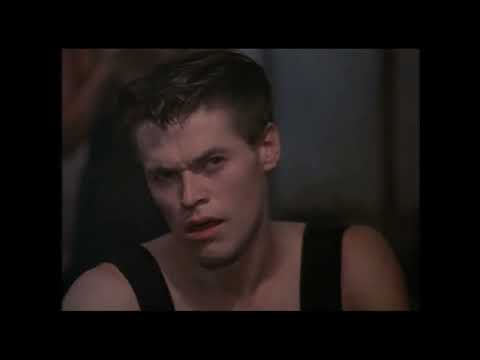Streets of Fire 1984 trailer still — Ellen Aim on stage with neon-lit crowd