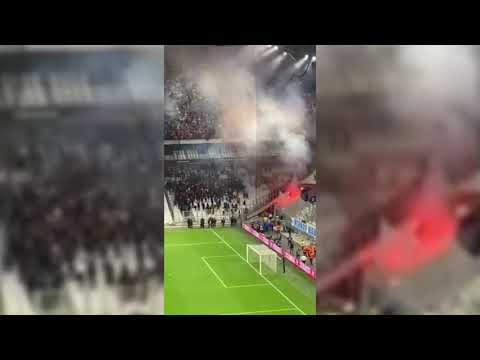 Rival fans throw flares at each other in, Marseille vs Galatasaray