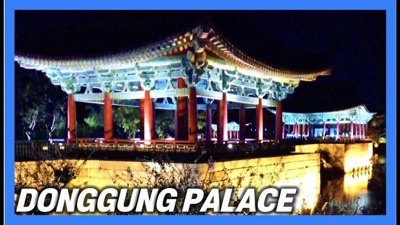 The Donggung Palace and Wolji Pond in Gyeongju illuminated at night with reflections of the wooden Silla dynasty palace buildings in the still water
