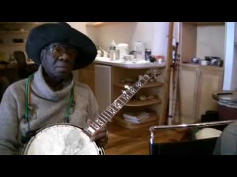 The EBONY HILLBILLIES' Norris Bennet explains "Frailing the Banjo" during CD session 4/26/10