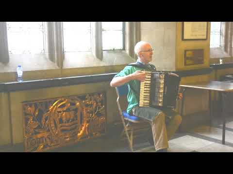 Dick Wolff playing accordion at Oxford Green Fair 2019