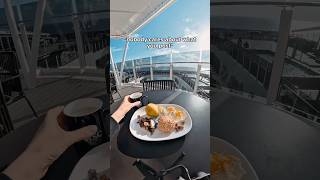 Coffee, a cruise view, and an MSC World Europa cruise ship
