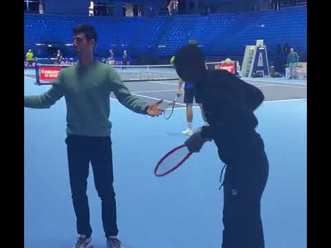 Novak Djokovic and Khabi Lame fooling around at Nitto ATP finals