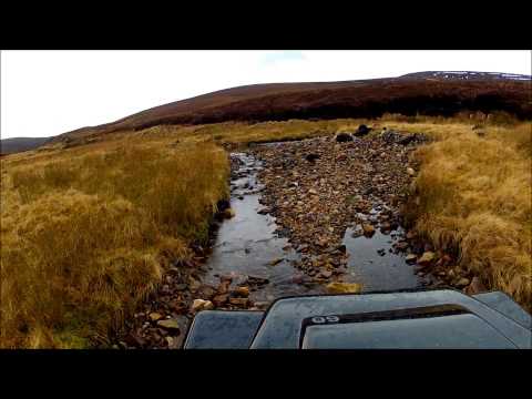 Land Rover Defender Offroading in River Crossings and Mud
