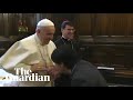 Pope Francis rebuffs worshippers trying to kiss his ring