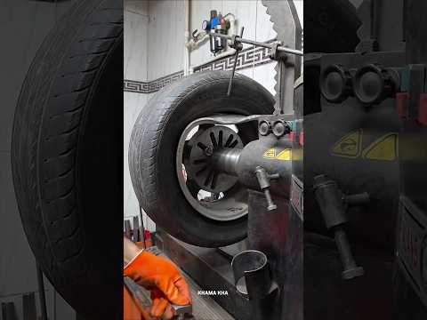Car repairman repairing a car wheel 🛞