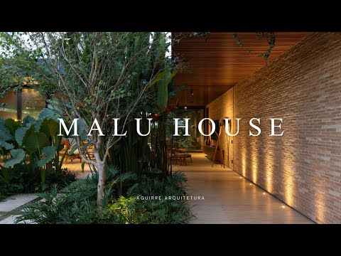Luxury House Design With The Protagonist of Lush Tropical Landscaping