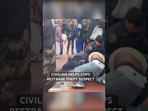 Civilian helps cops restrain theft suspect #nypd #shorts video credit queens media nyc