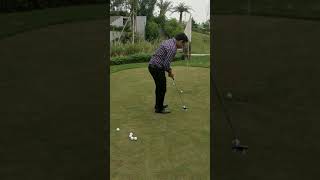 Yoginder Kasana playing golf in Delhi golf course area