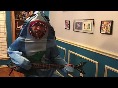 Jaws Theme on Shark Guitar Played by a Shark Man