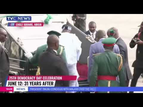 Nigerian President Bola Tinubu falls while boarding the parade vehicle