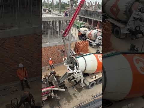 Collaboration Of Concrete Mixing Truck And Concrete Pump Truck