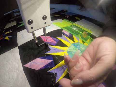 Longarm Quilting, Ruler work on the Paper piece Stars