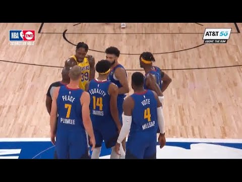 Dwight Howard getting into Nuggets players heads by sneaking in their team huddle