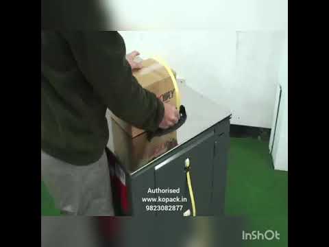 Kopack corrugated box strapping machine