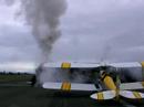 J1211 on Gisborne runway next to tiger moth