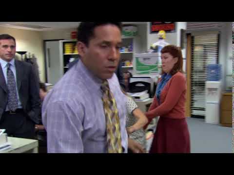 Oscar pushes Angela. Dwight gets angry