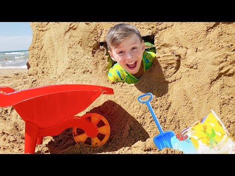 Ali and Adriana playing hide and seek on the beach,  Kids made Sand Castle w/ Sand Toys for babies
