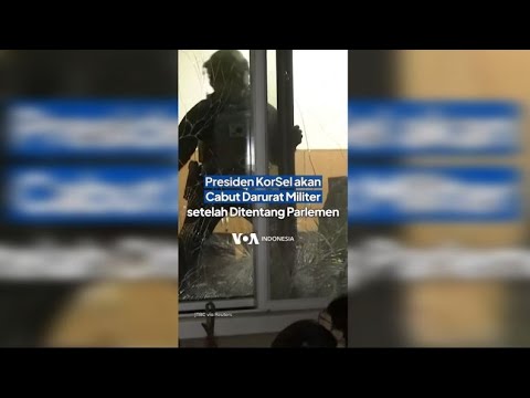 VOA - PRESIDEN KORSEL AKAN CABUT DARURAT MILITER SETELAH PARLEMEN MENENTANG