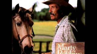 Marty Robbins sings She was young and she was  Pretty