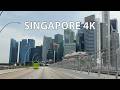 Singapore 4K Futuristic Tropical City Skyline Driving Downtown