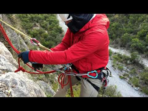 Passing a Knot on Rappel