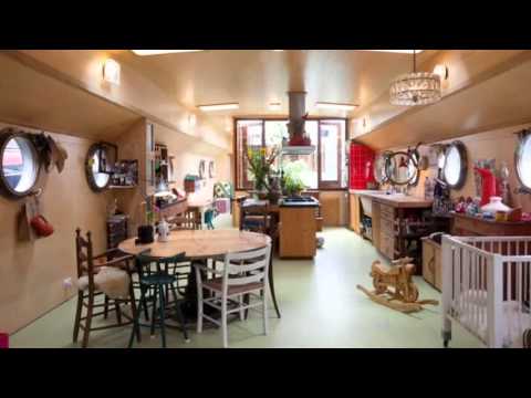 BBVH overhauls belgian barge into airy amsterdam houseboat