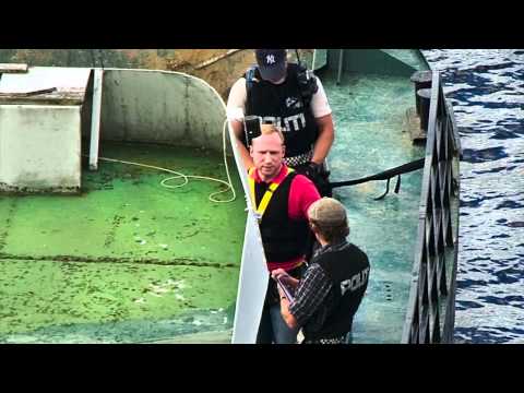 Norway 13 August 2011 - Anders Behring Breivik being taken back to Utøya