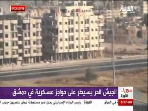 اشتباكات بين عناصر الجيش الحر وقوات النظام على احدى الحواجز في الغوطة الشرقية