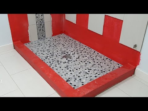 Install a pebble tile/river rock shower floor.