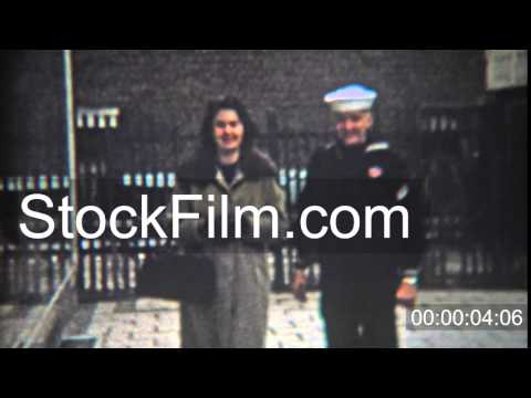 1966: Women and military sailor walking urban european streets. ROTTERDAM